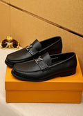 Louis Vuitton Black Pebbled Loafers — hero