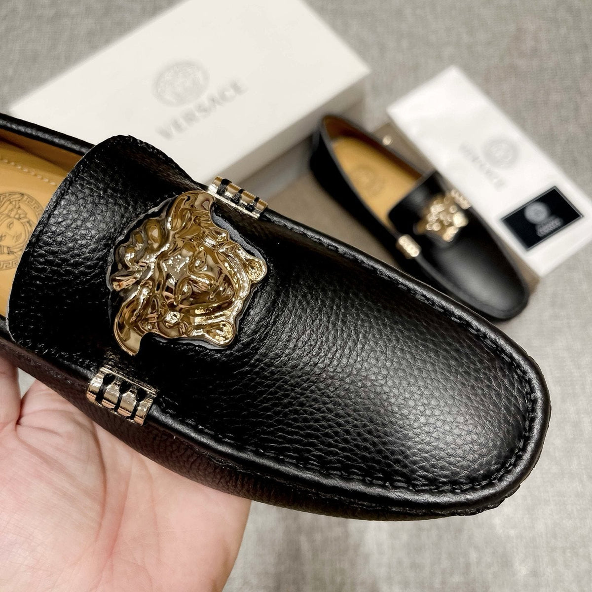 Versace Textured Leather Medusa Loafers — model