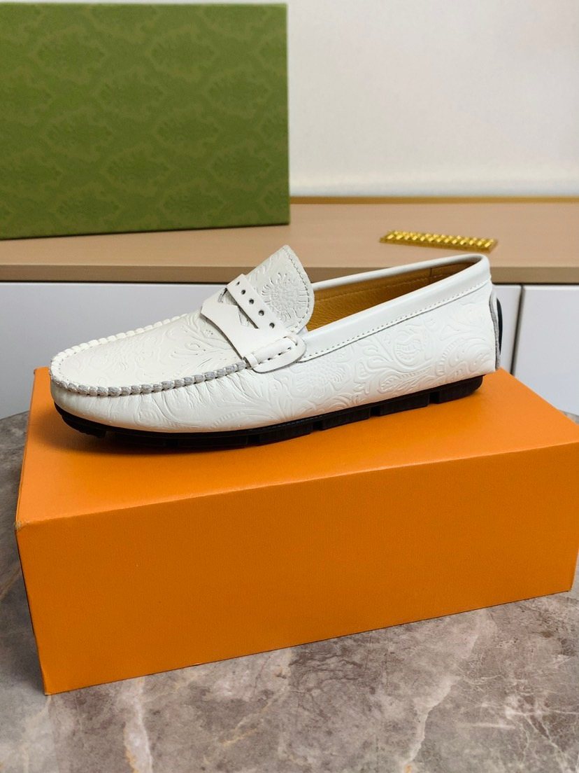 Louis Vuitton White Leather Moc-Toe Loafers — side