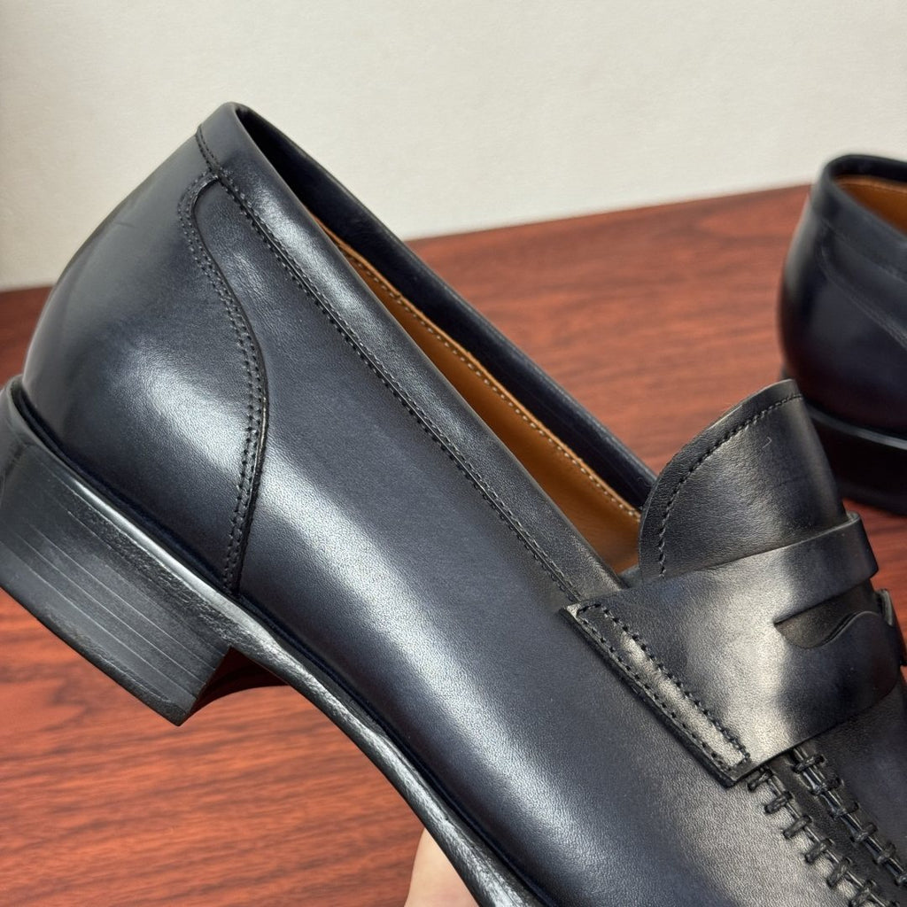 Berluti Burnished Penny Loafers — label