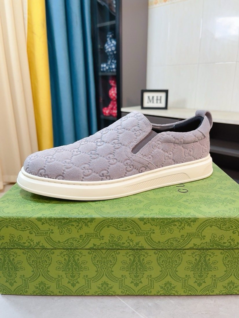 Gucci Embossed Slip-On Sneakers — side
