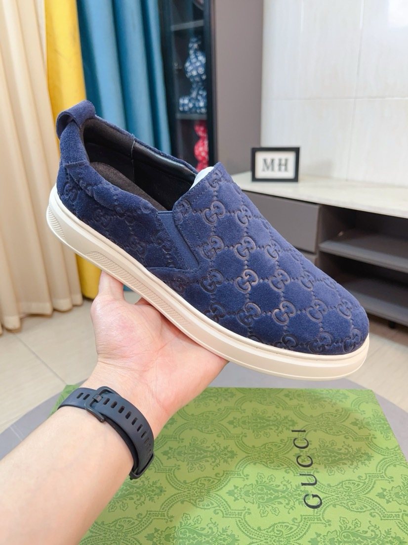 Gucci Embossed Slip-On Sneakers — front