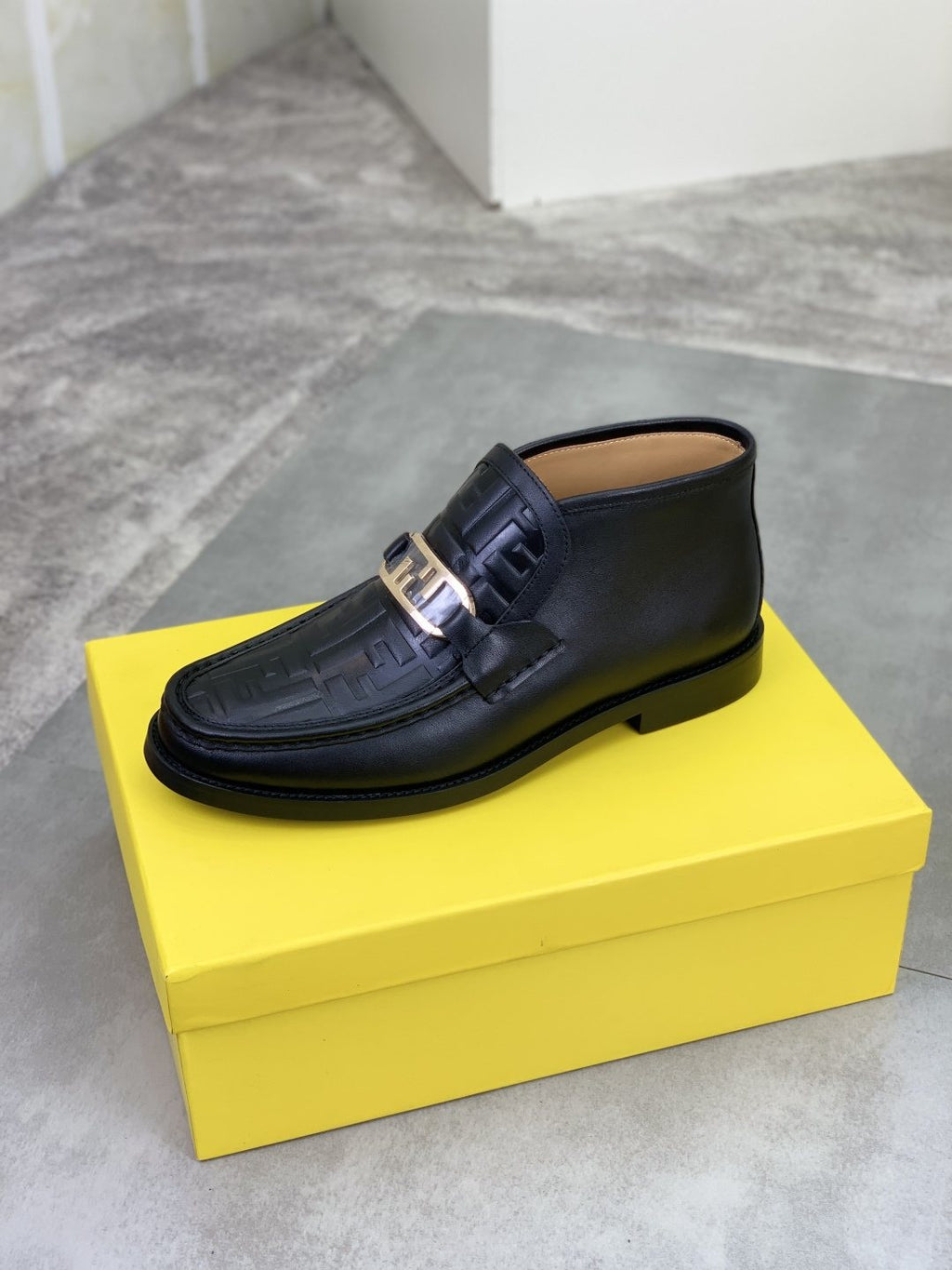 Fendi Embossed Metal-Hardware Slip-On Boots — front