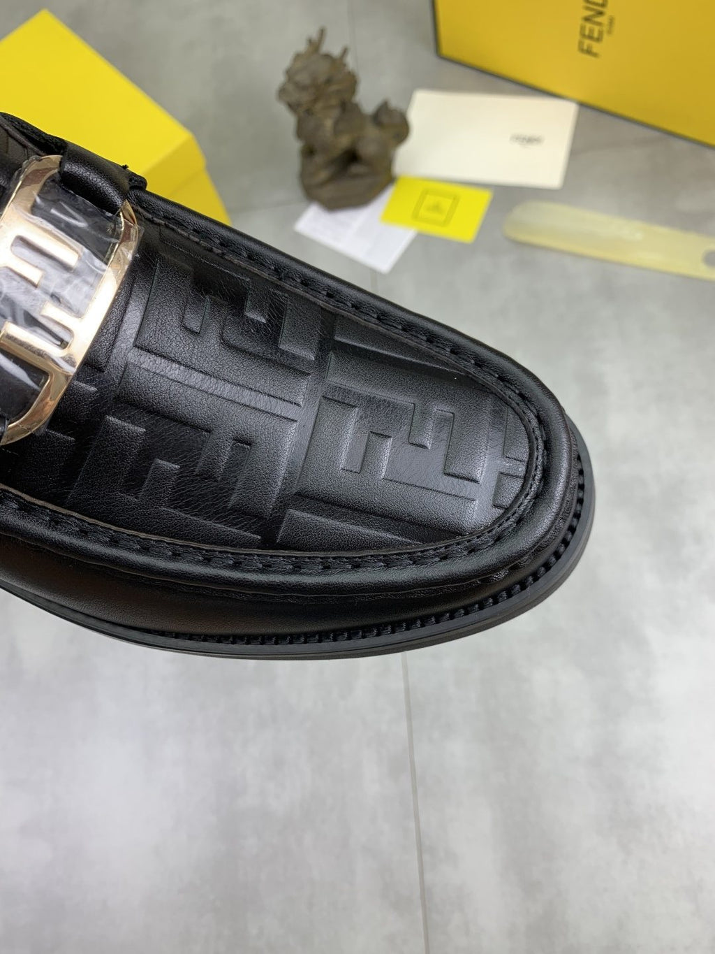 Fendi Embossed Metal-Hardware Slip-On Boots — detail