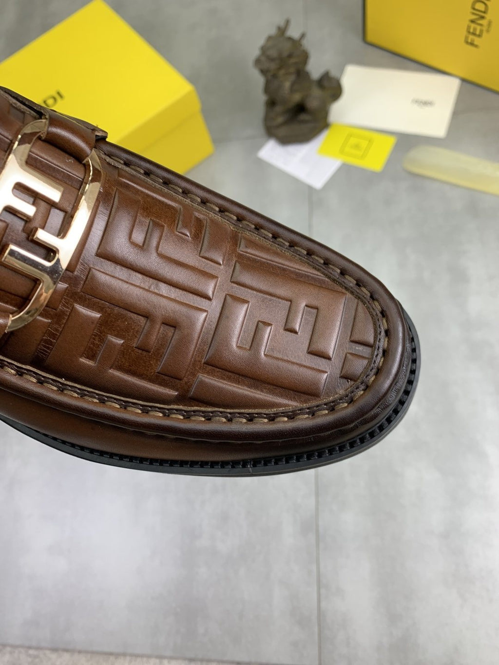 Fendi Embossed Metal-Hardware Slip-On Boots — detail