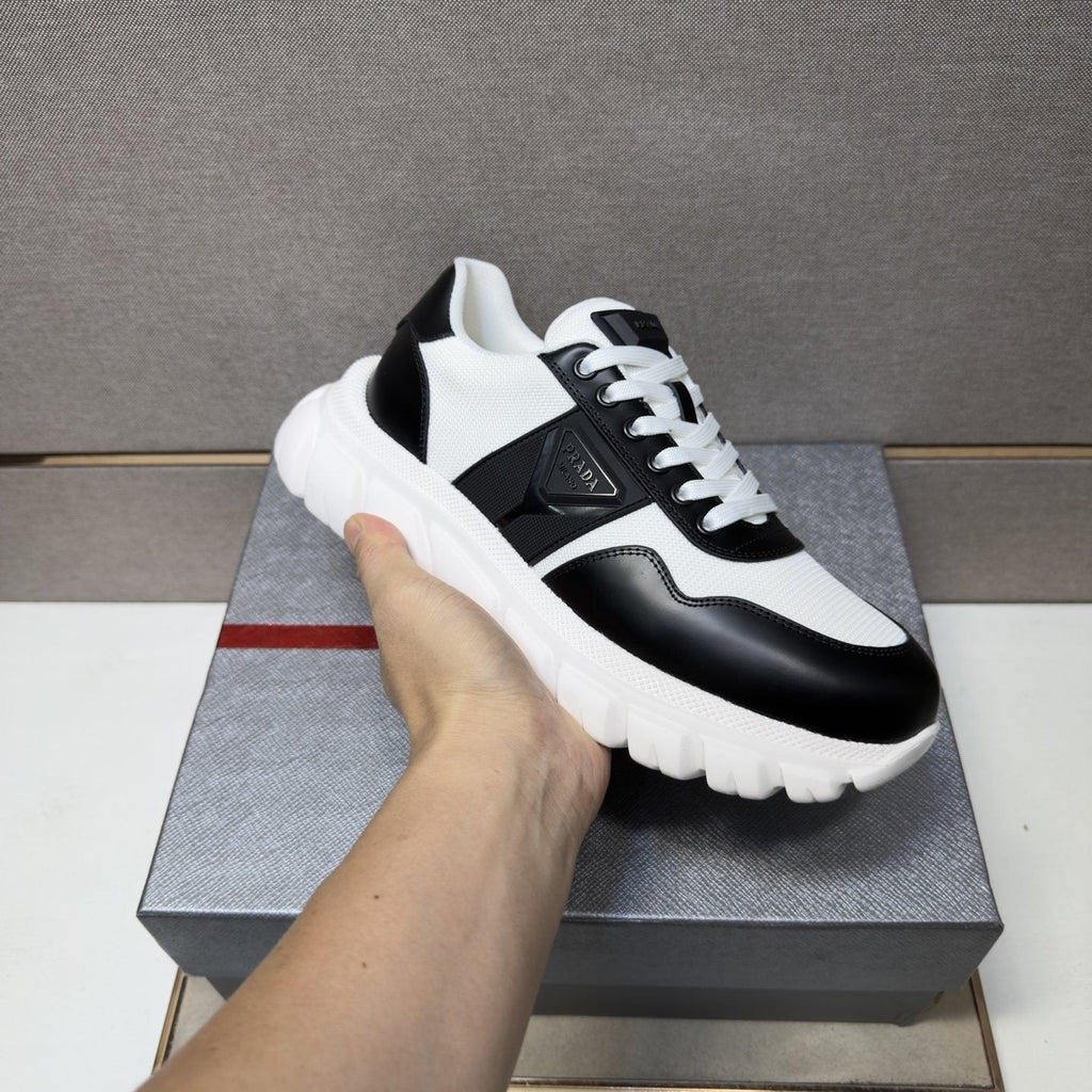 Prada Paneled Low-Top Sneakers — model