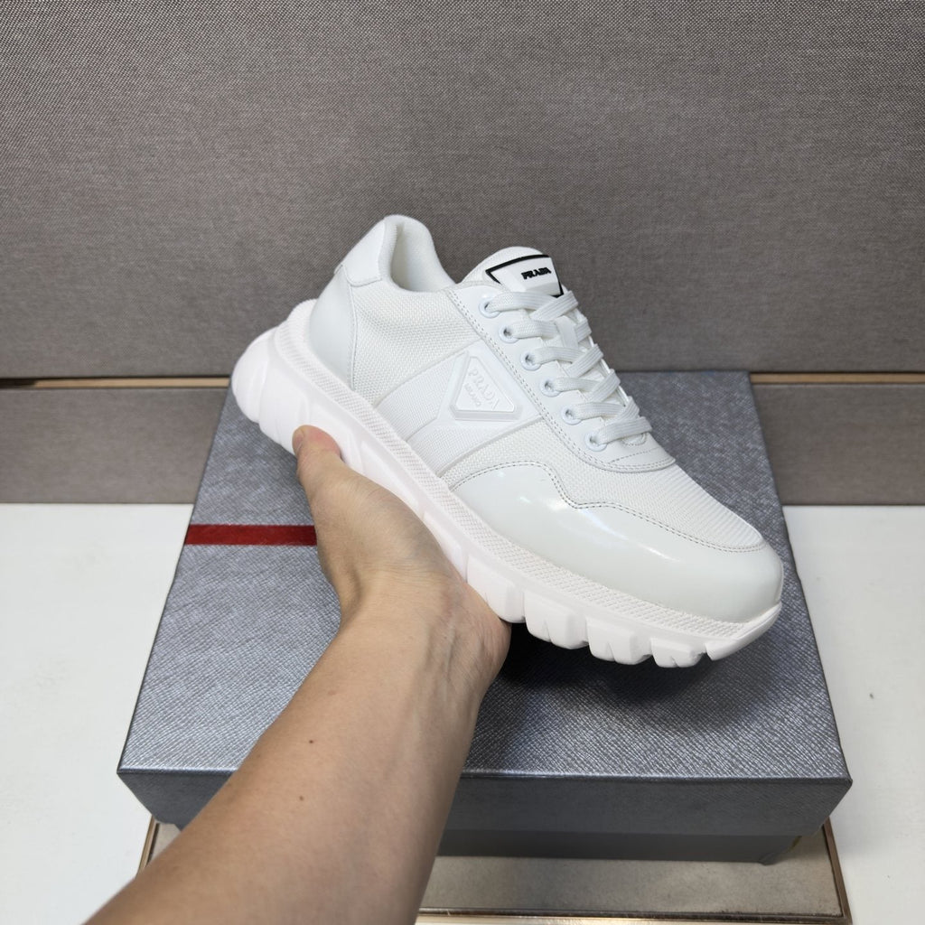 Prada Paneled Low-Top Sneakers — model