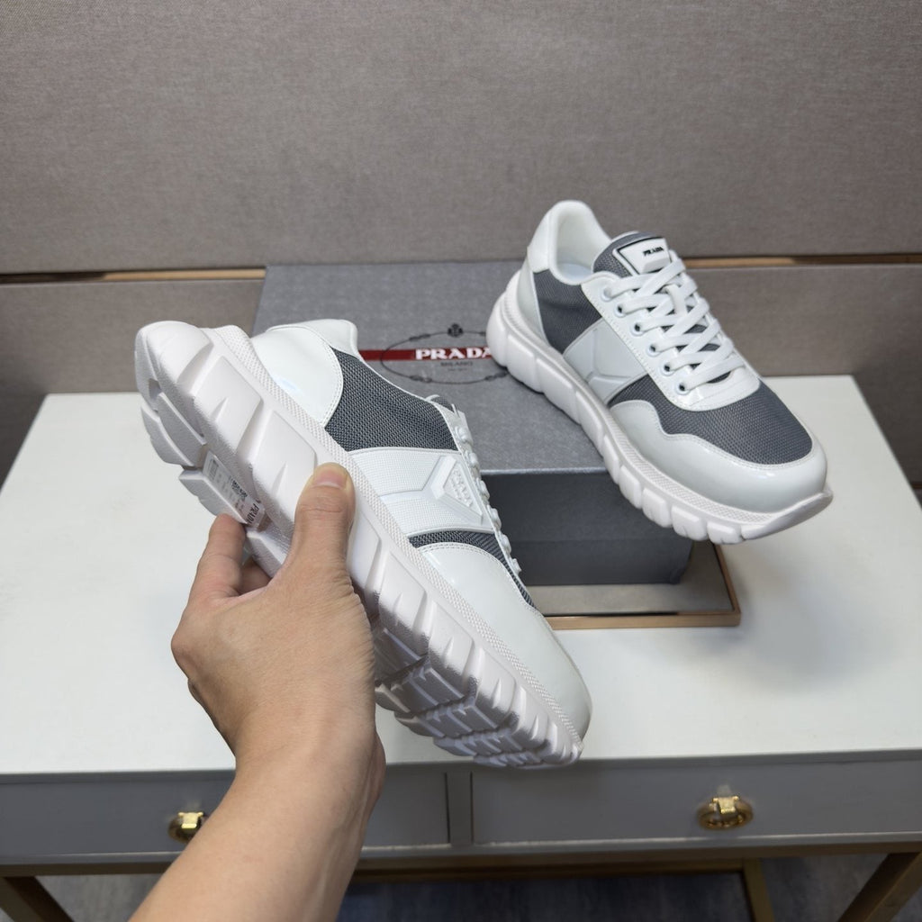 Prada Paneled Low-Top Sneakers — model