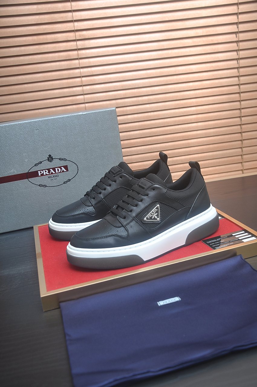 Prada Triangle Plaque Low-Top Sneakers — front
