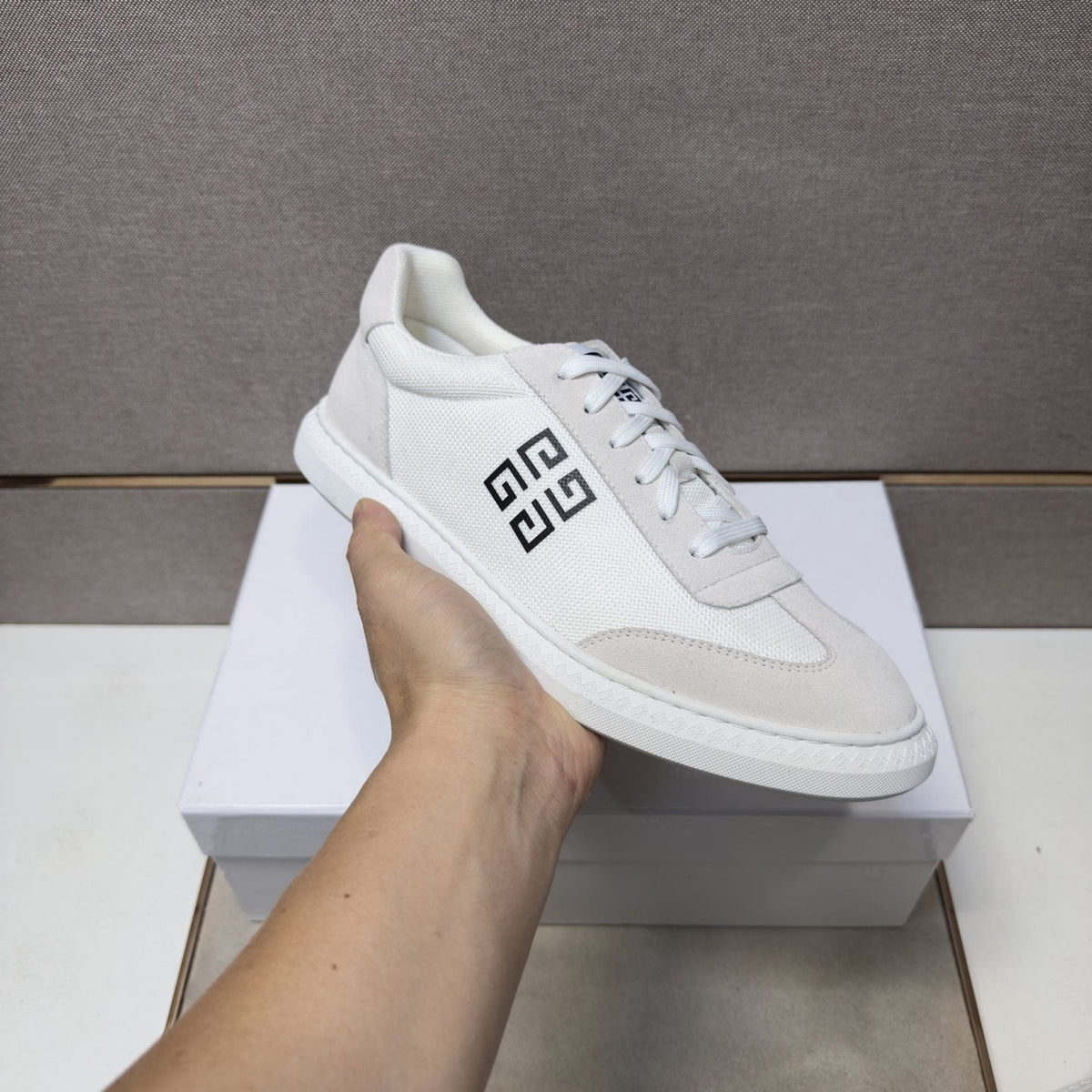 Givenchy Geometric Emblem Low-Top Sneakers — model