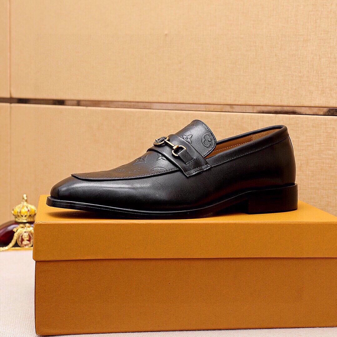 Louis Vuitton Embossed Buckle Loafers — side