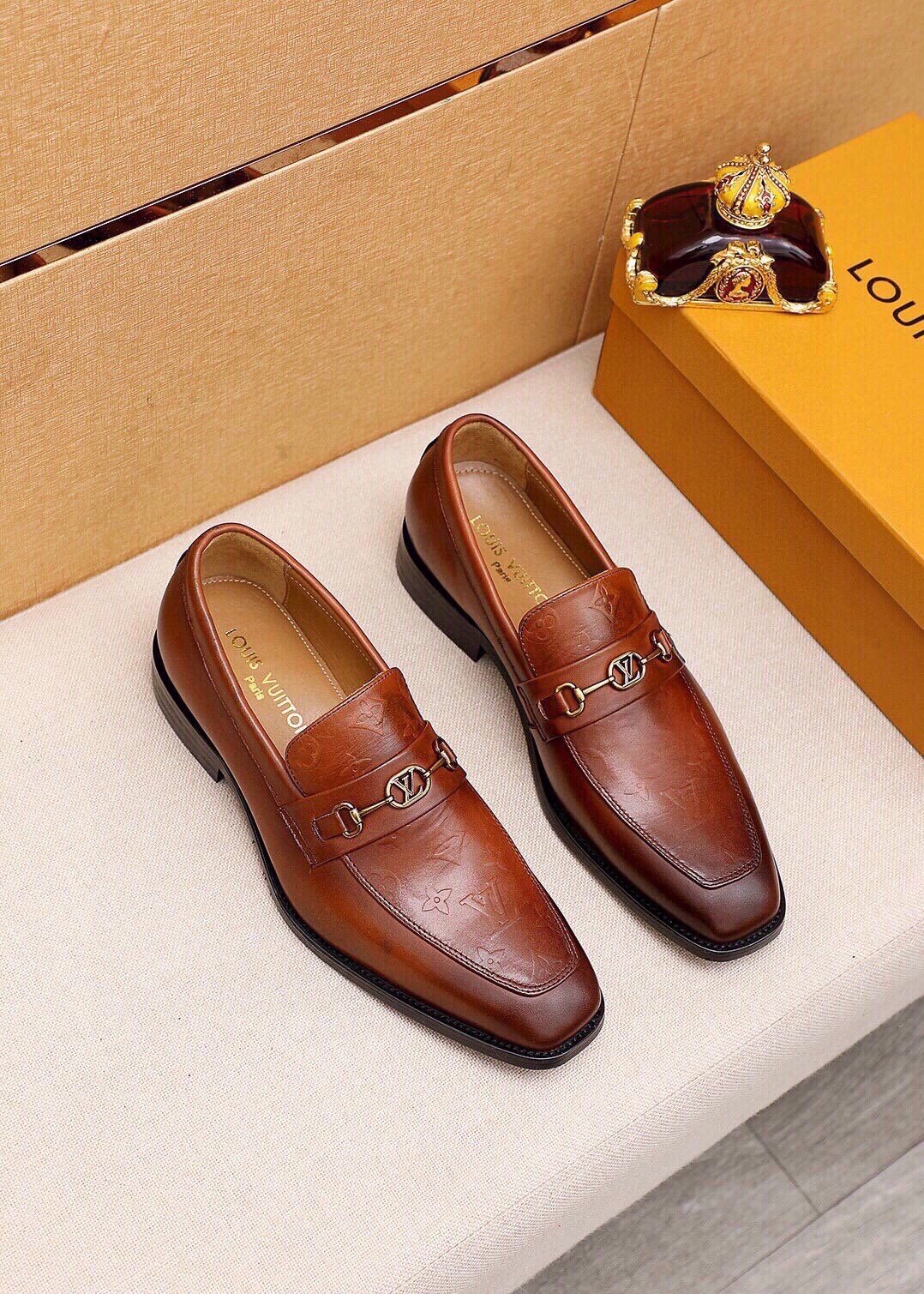 Louis Vuitton Embossed Buckle Loafers — front