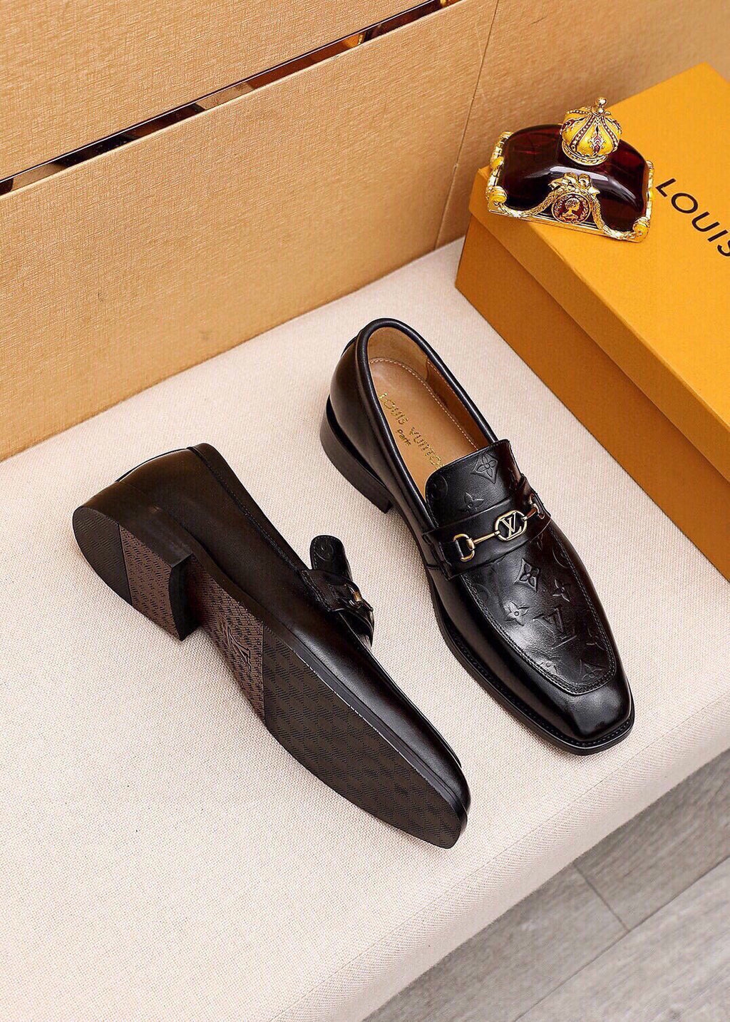 Louis Vuitton Embossed Buckle Loafers — front