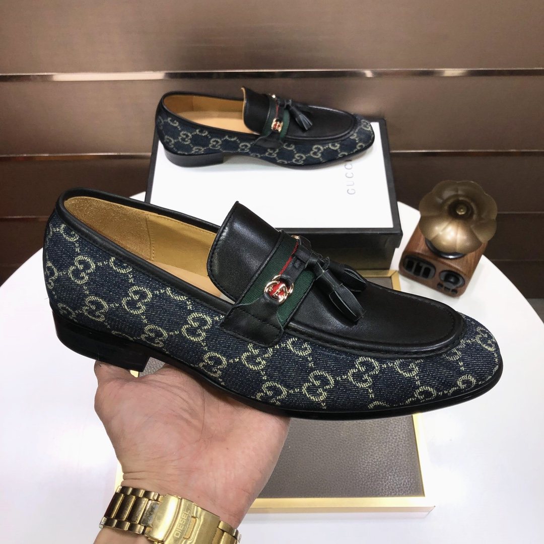 Gucci Monogram Tassel Loafers — model