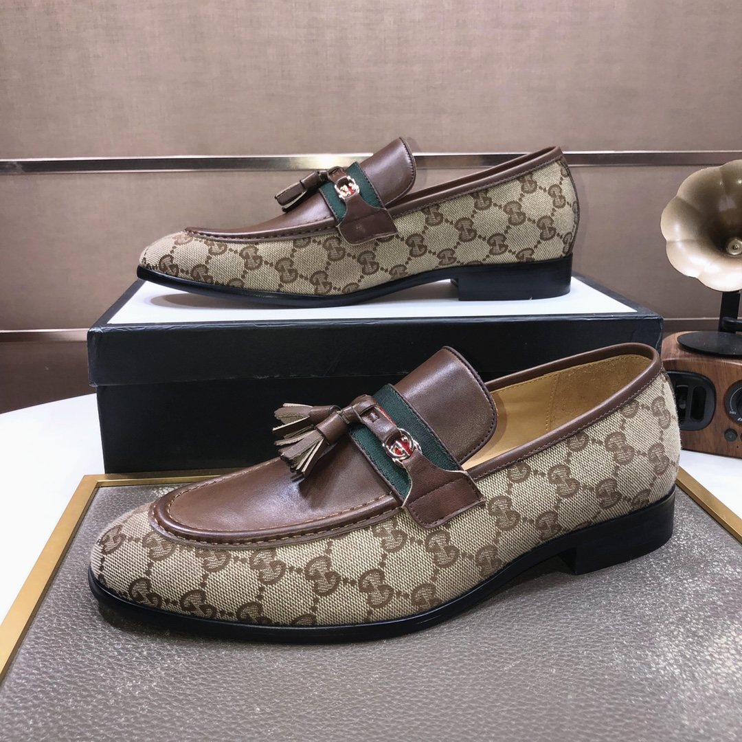 Gucci Monogram Tassel Loafers — side