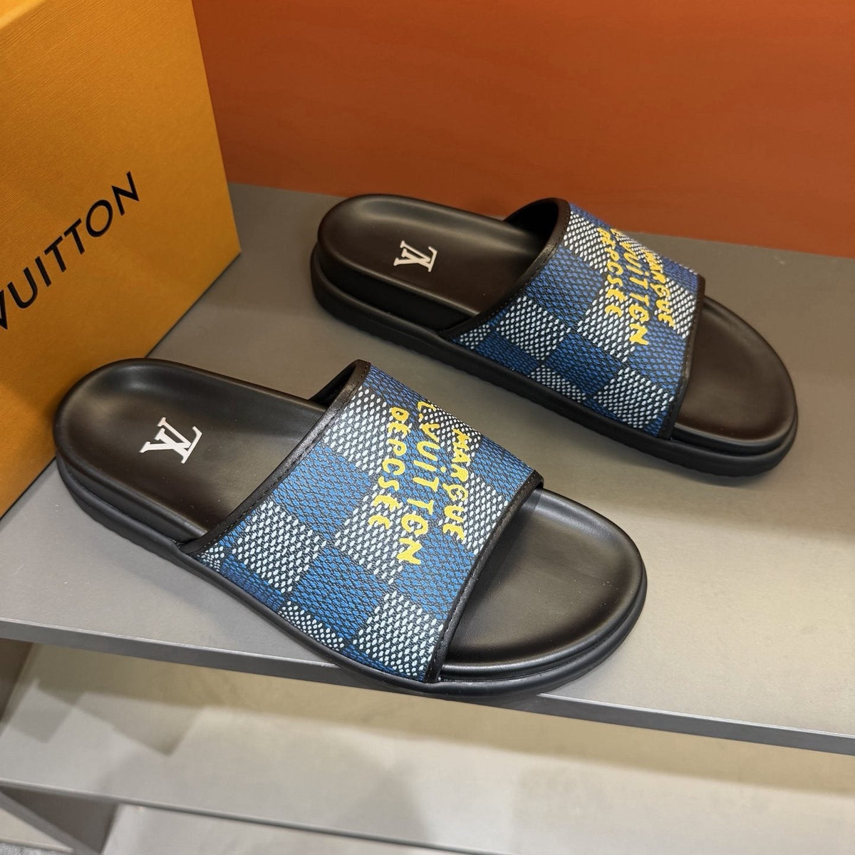 Louis Vuitton Patterned Strap Slides — front