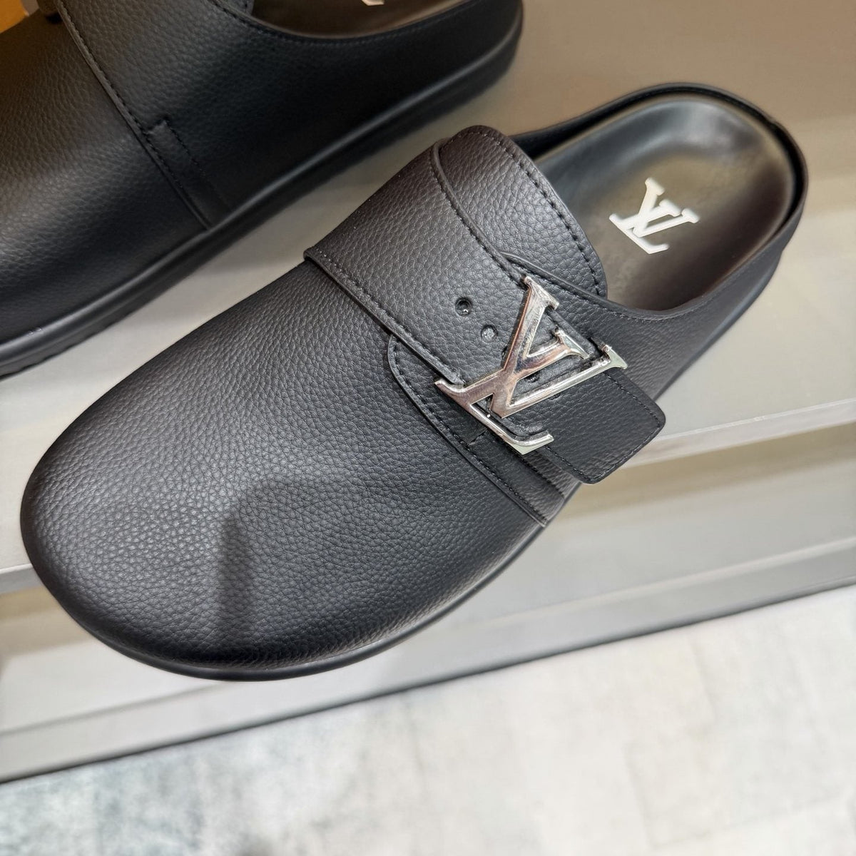 Louis Vuitton Textured Buckle Slide Sandals — detail
