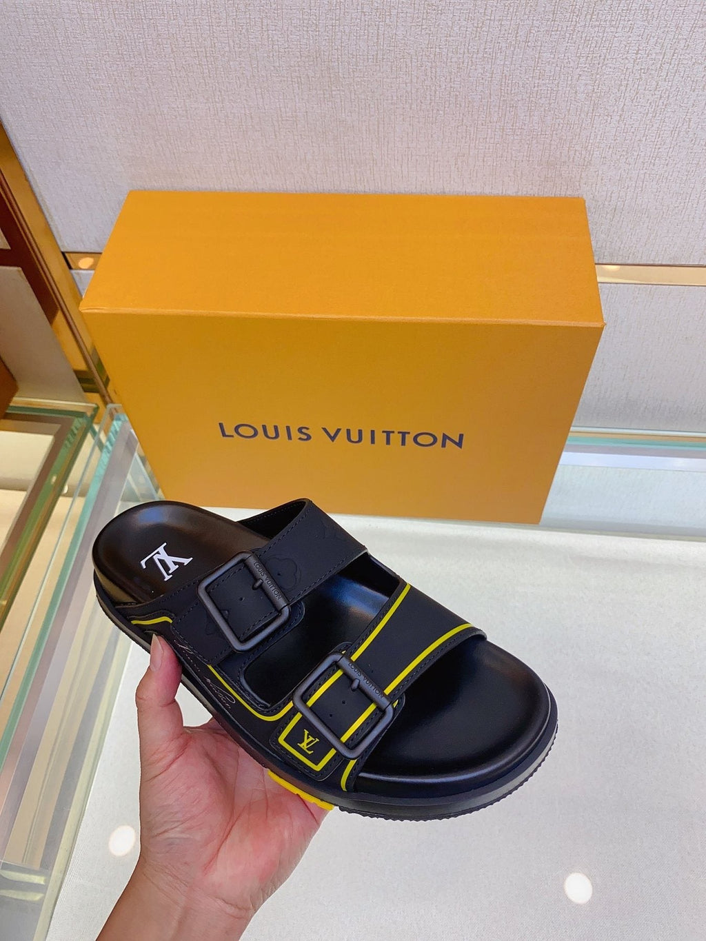 Louis Vuitton Two-Buckle Slide Sandals — model