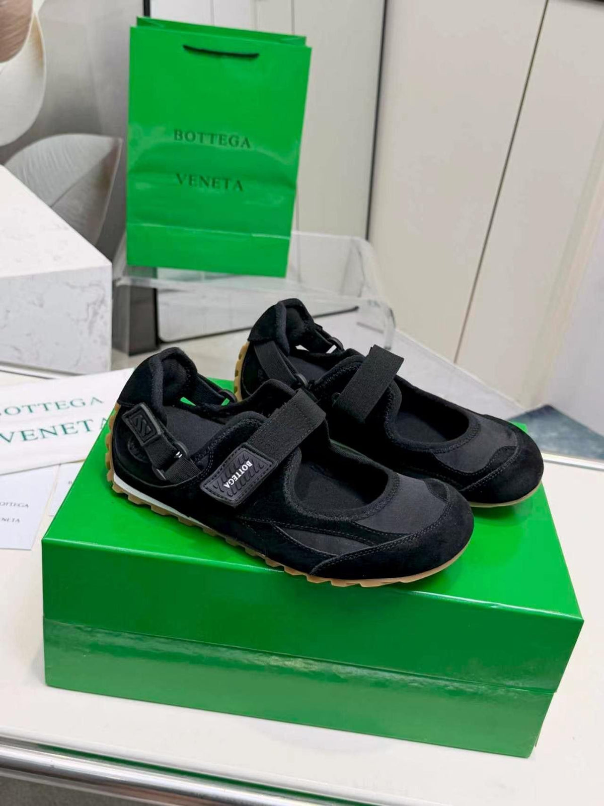 Bottega Veneta Buckled Strap Low-Top Sneakers — side