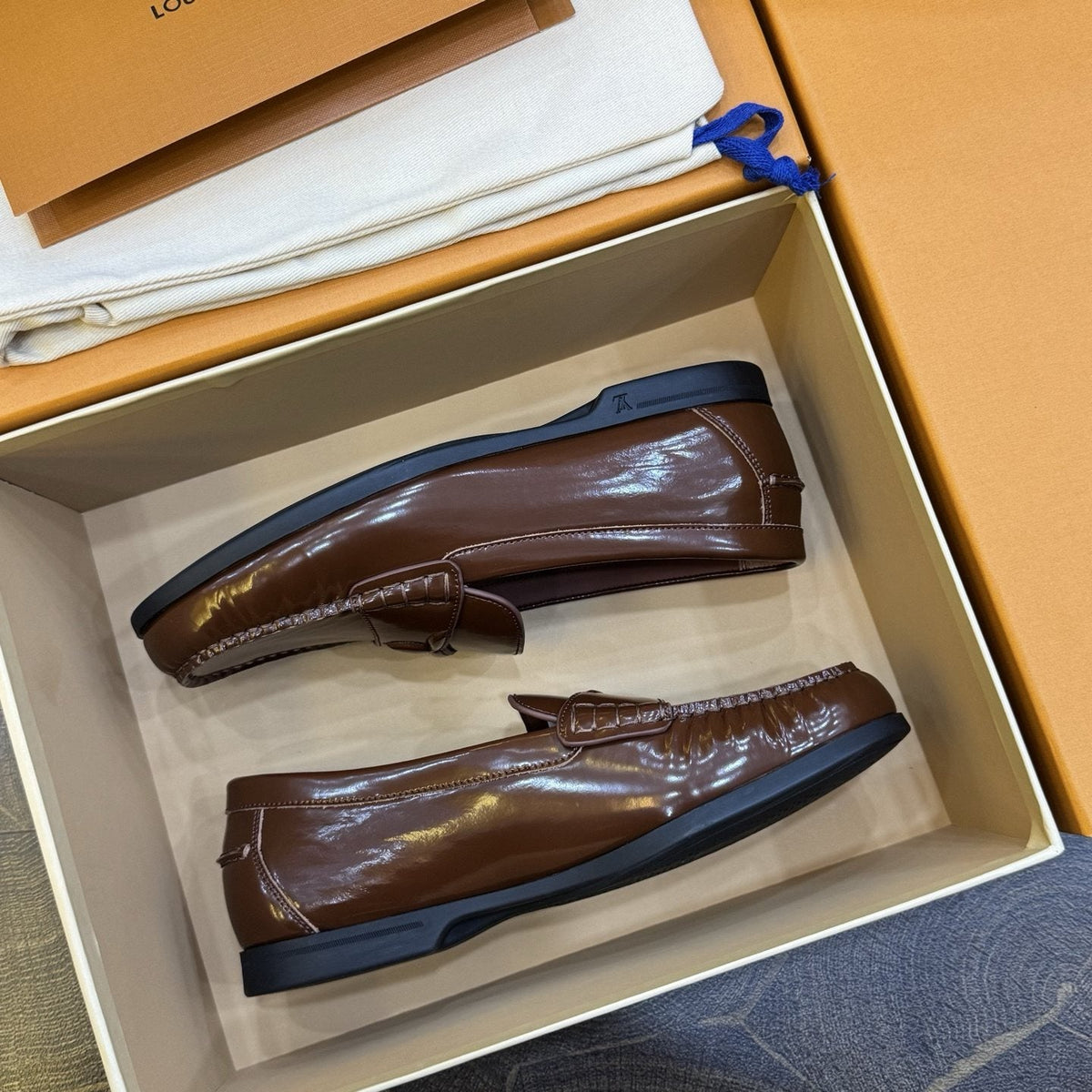 Louis Vuitton Brown Penny Loafers — front