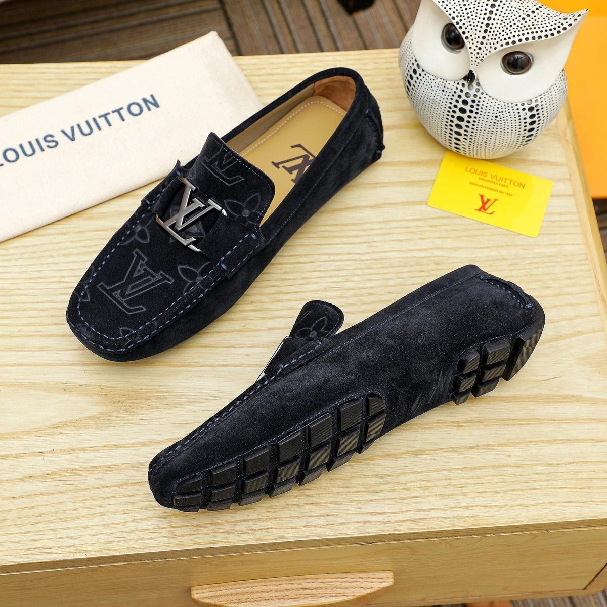 Louis Vuitton Embossed Driving Loafers — front