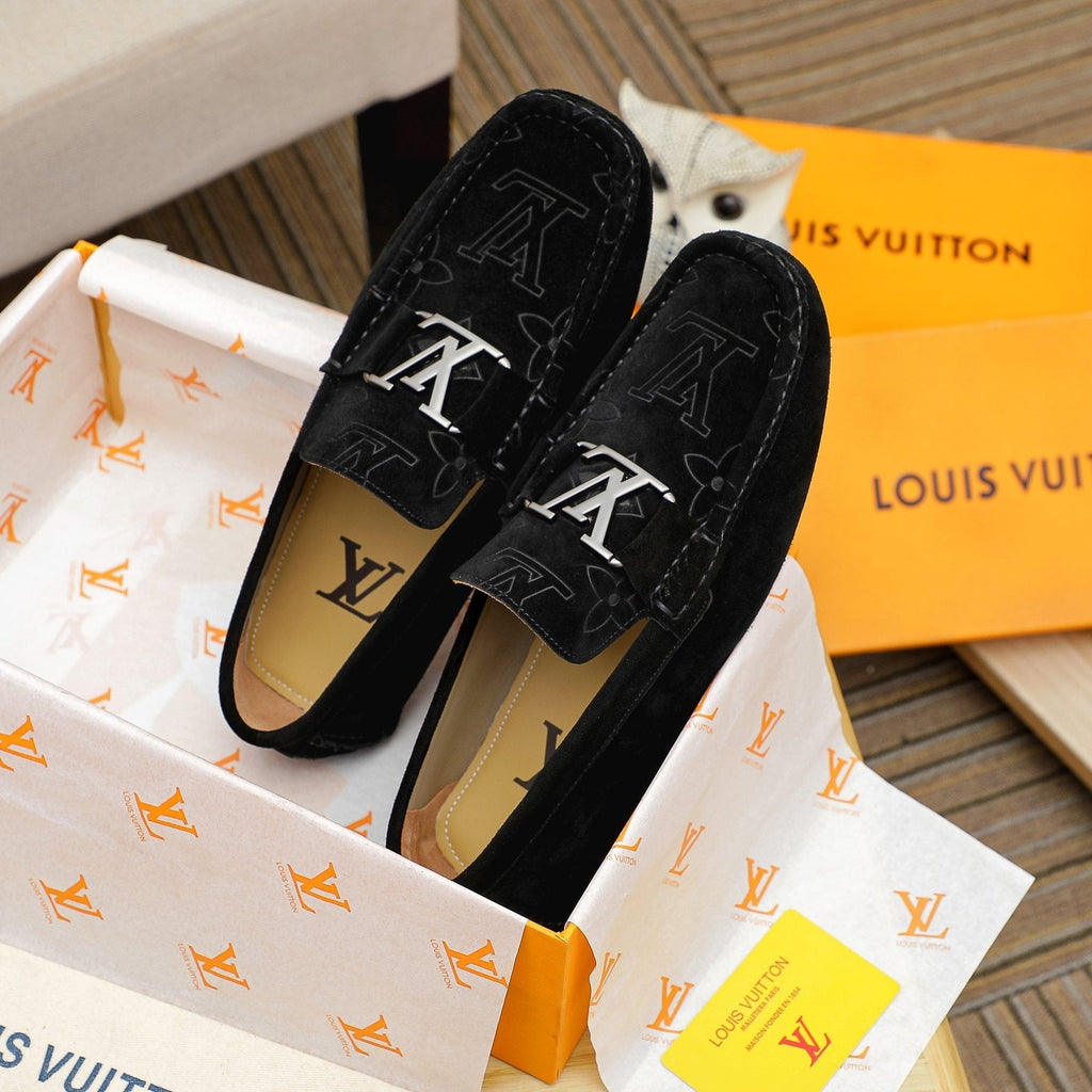 Louis Vuitton Embossed Driving Loafers — front