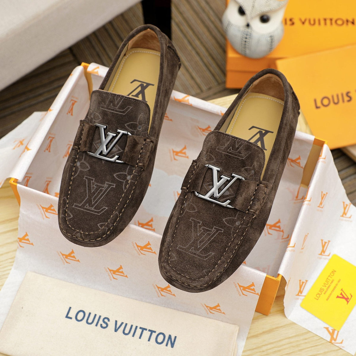 Louis Vuitton Embossed Driving Loafers — front