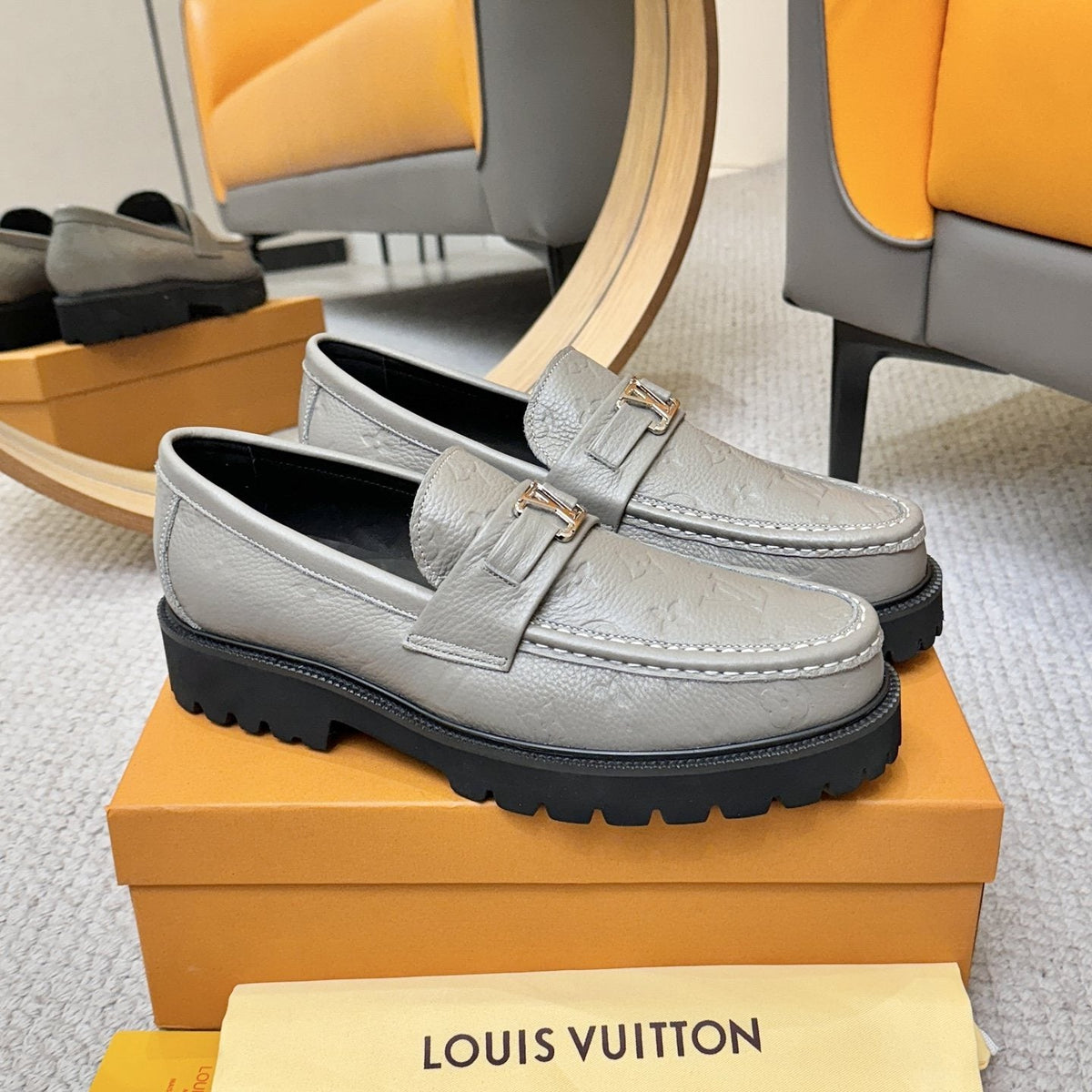 Louis Vuitton Embossed Lug Sole Loafers — side