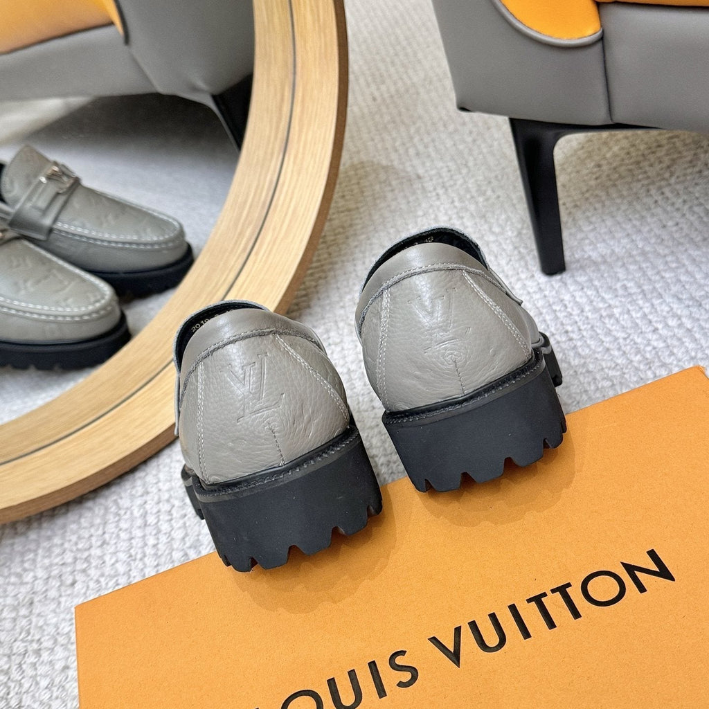 Louis Vuitton Embossed Lug Sole Loafers — side