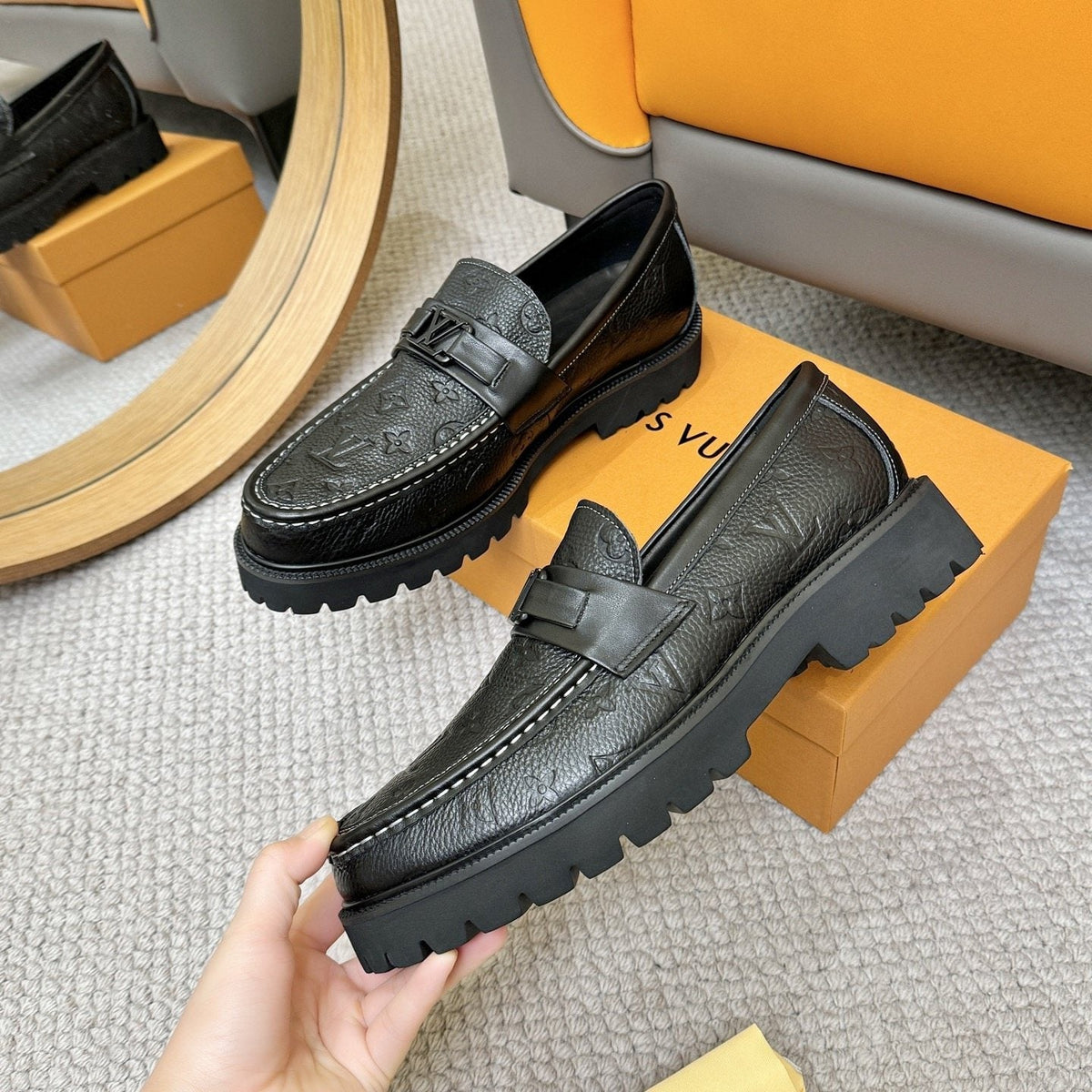 Louis Vuitton Embossed Lug Sole Loafers — model