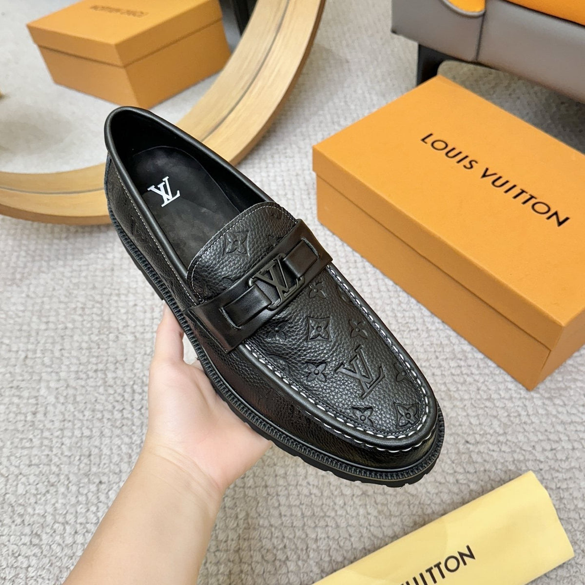 Louis Vuitton Embossed Lug Sole Loafers — model