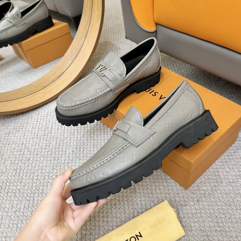 Louis Vuitton Embossed Lug Sole Loafers — front