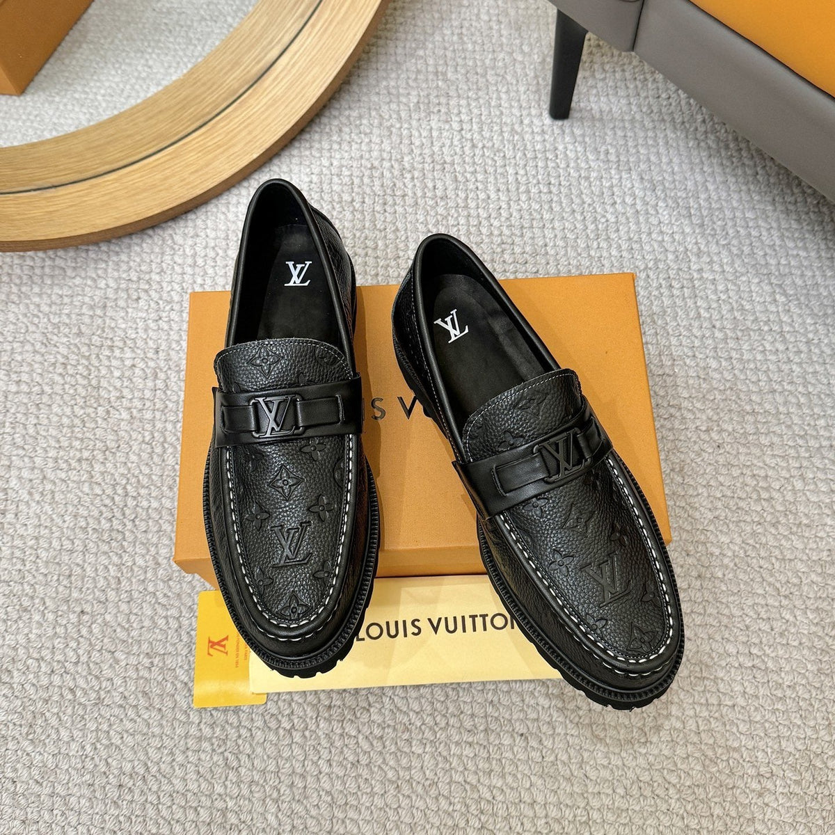 Louis Vuitton Embossed Lug Sole Loafers — hero