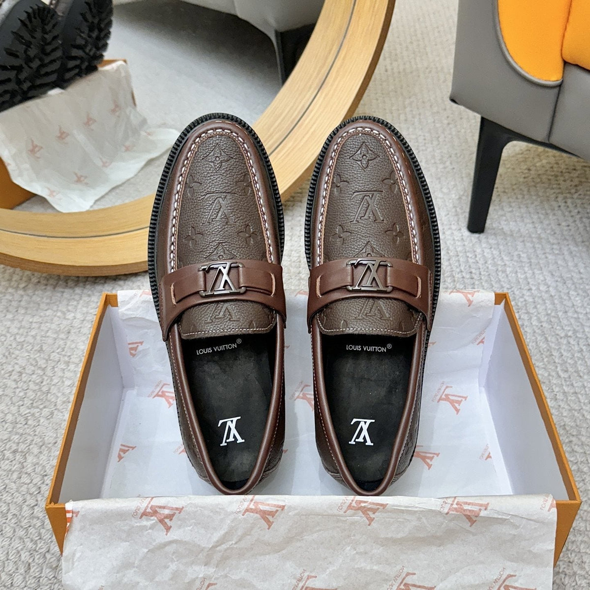 Louis Vuitton Embossed Lug Sole Loafers — side