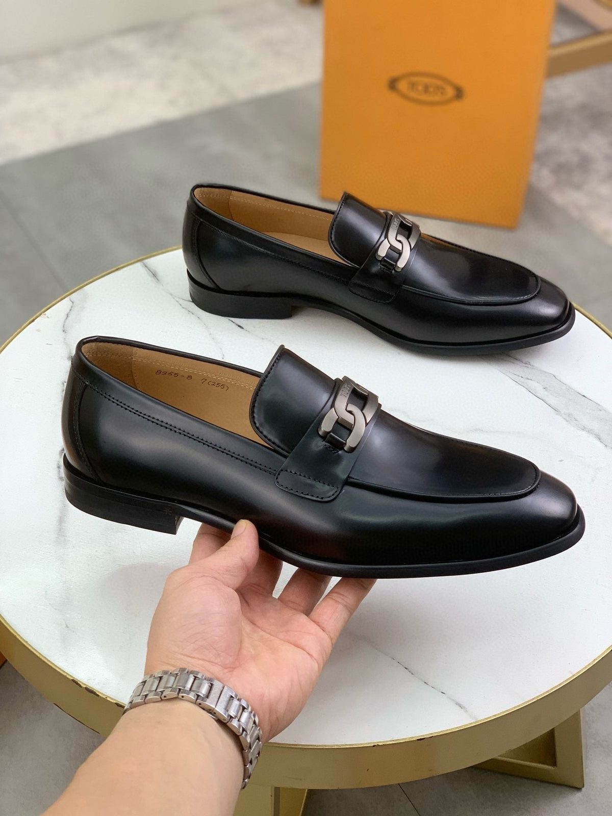 TOD'S Black Metal-Accent Loafers — model