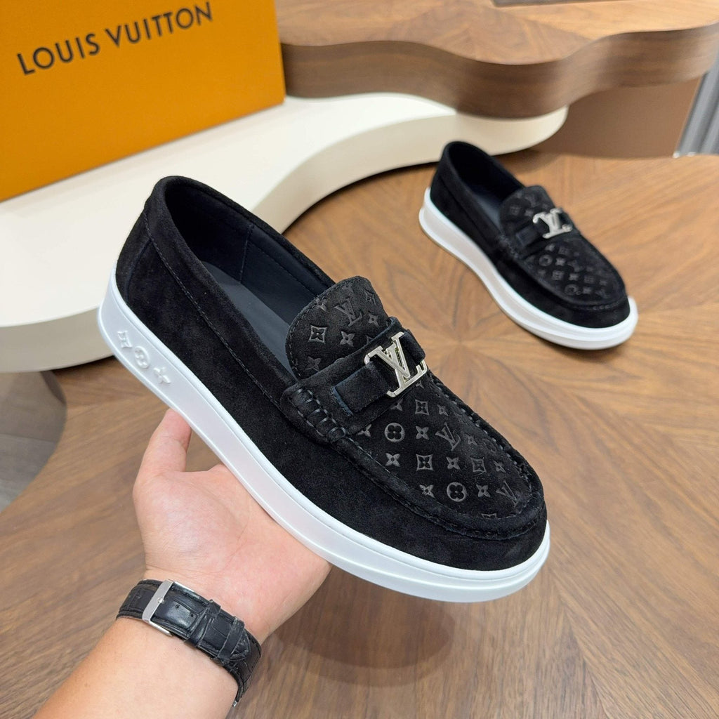 Louis Vuitton Monogram Slip-On Sneakers — model