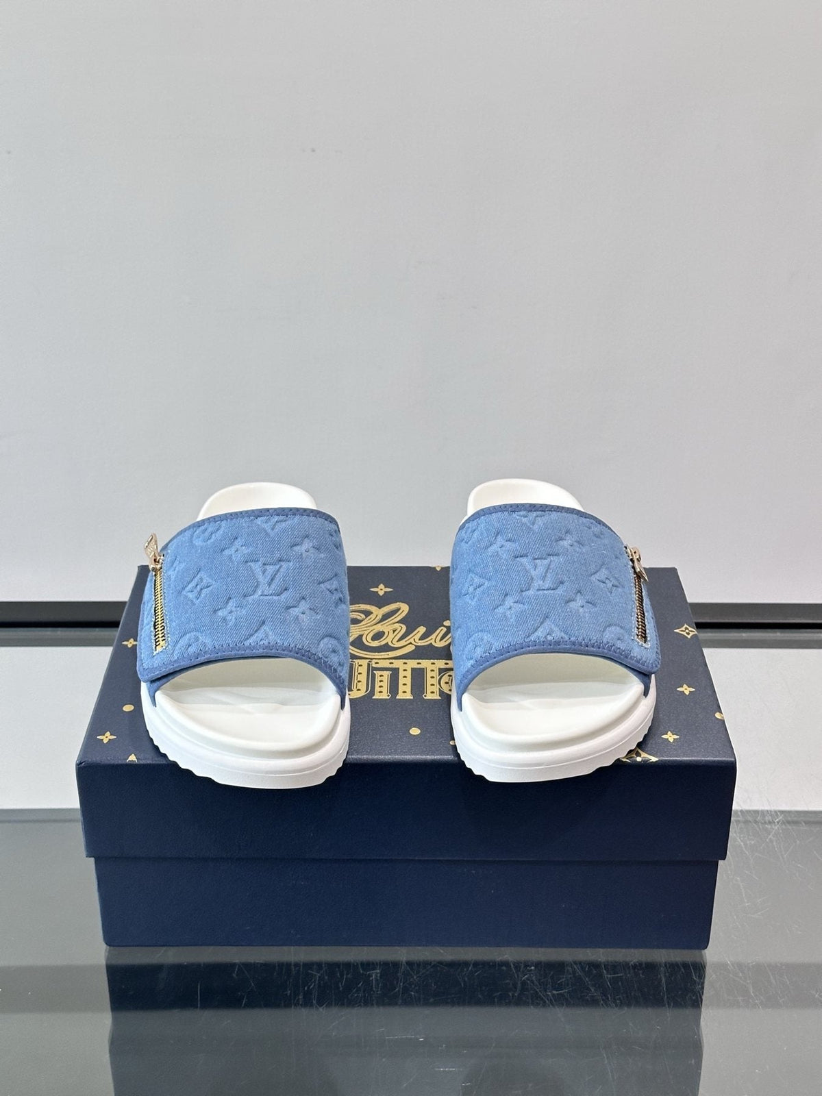 Louis Vuitton Embossed Monogram Slide Sandals — front