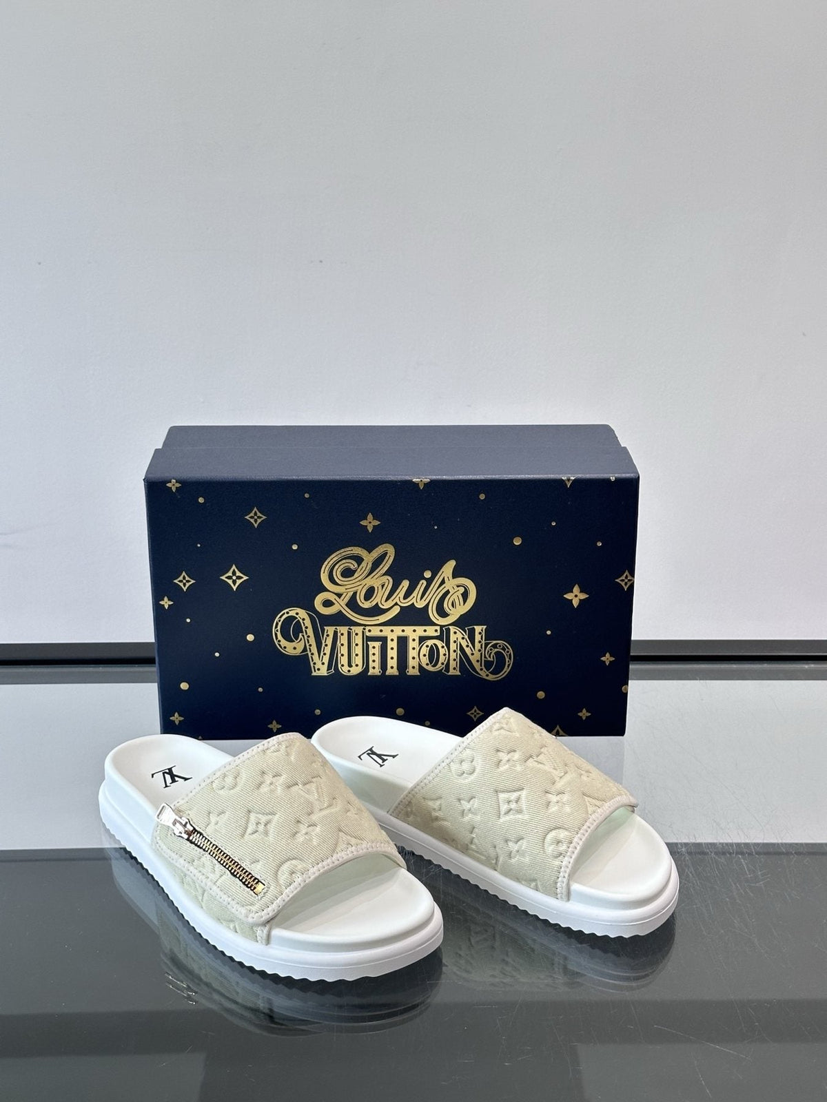 Louis Vuitton Embossed Monogram Slide Sandals — front