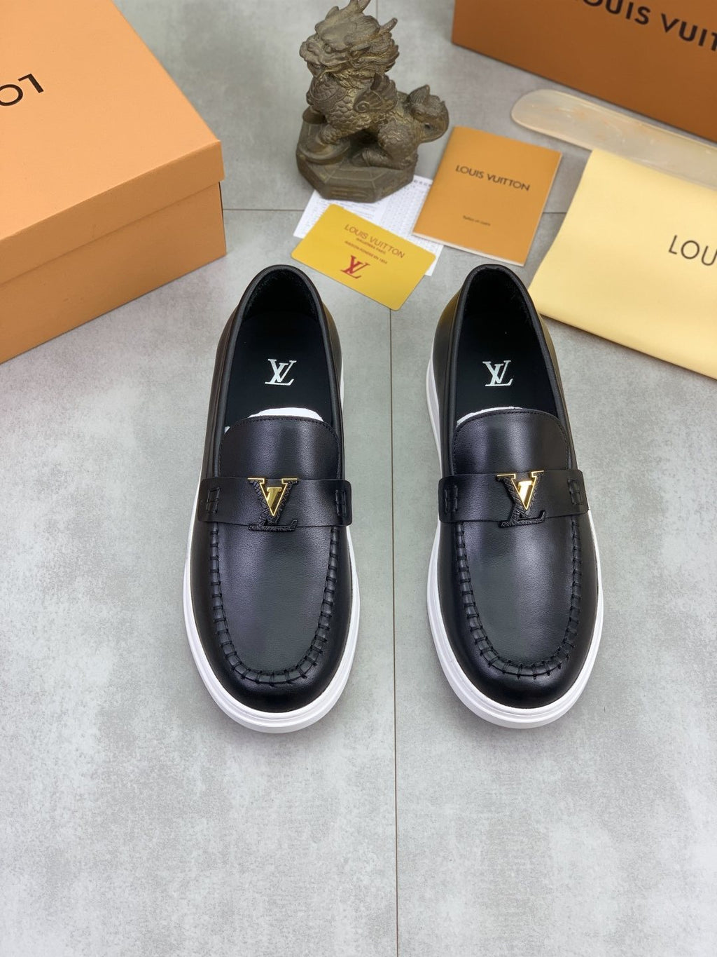 Louis Vuitton Metal Emblem Slip-On Loafers — hero