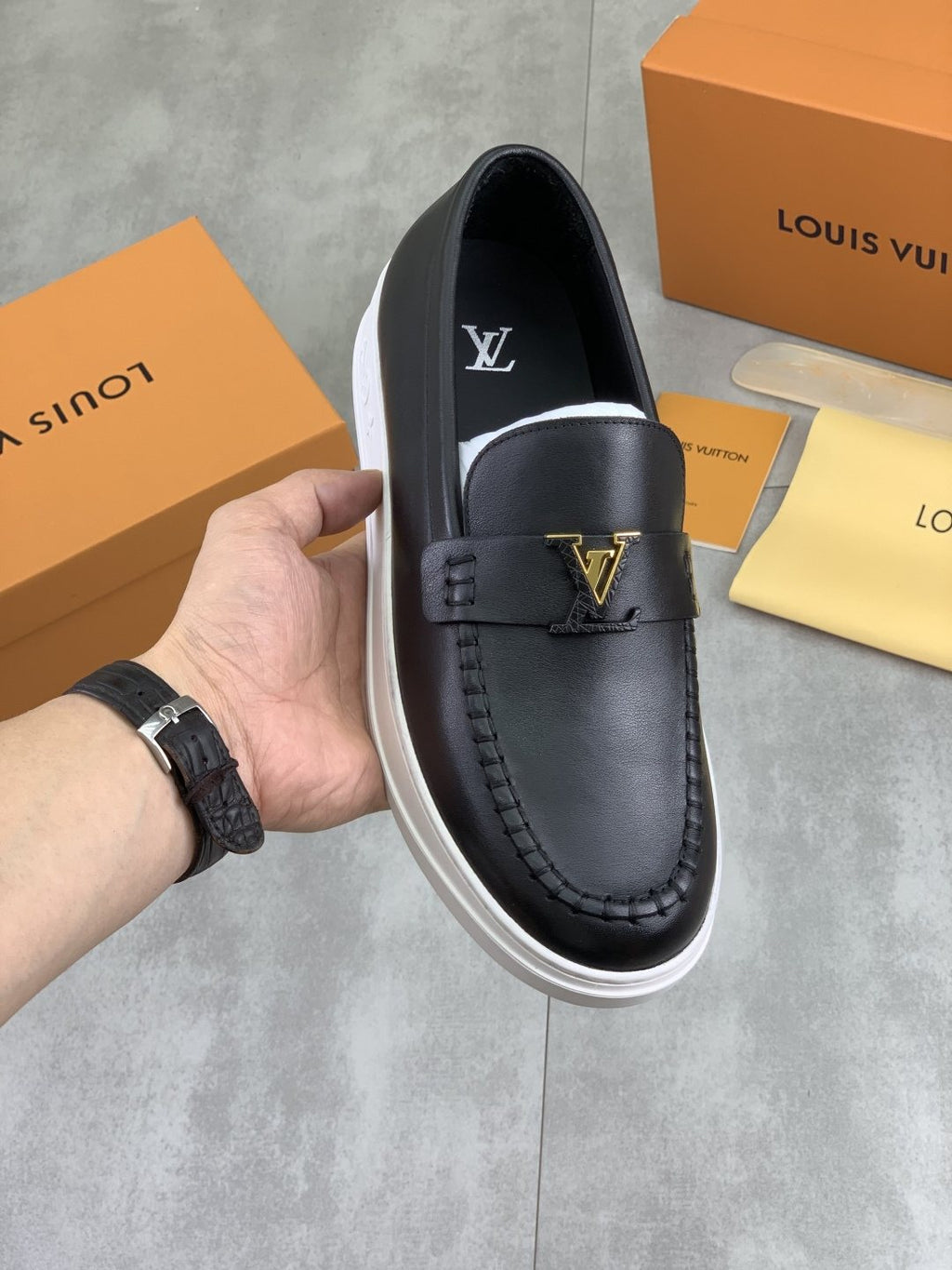 Louis Vuitton Metal Emblem Slip-On Loafers — front