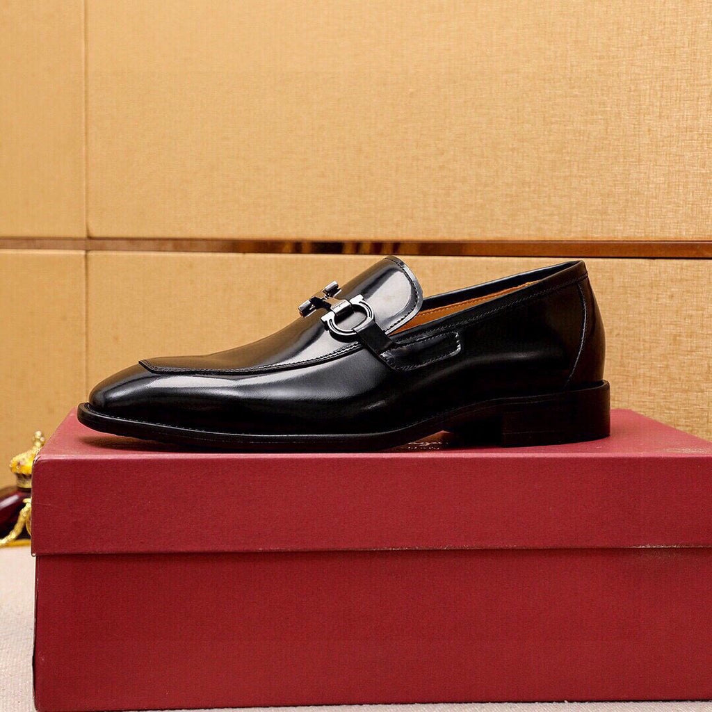 Ferragamo Buckle Leather Loafers — model