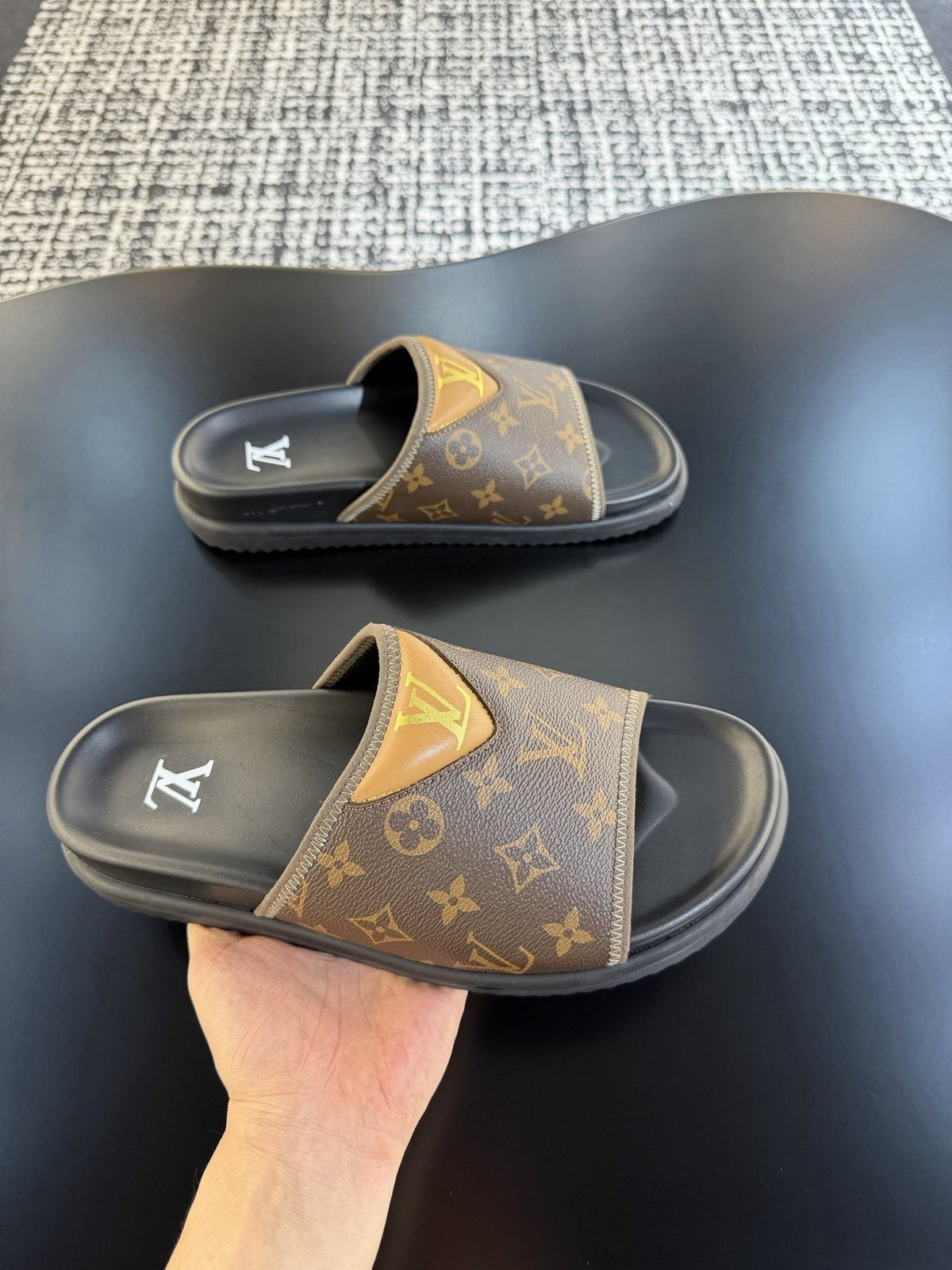 Louis Vuitton Monogram V Slide Sandals — model