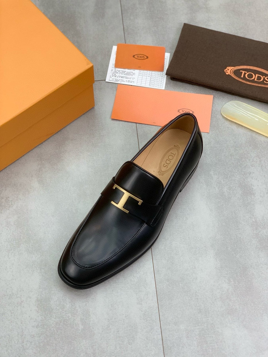 TOD'S Black Gold-Tone Hardware Loafers — front