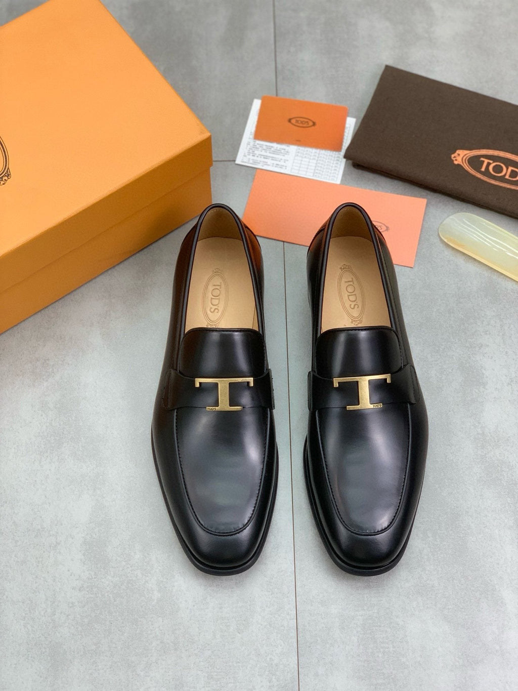 TOD'S Black Gold-Tone Hardware Loafers — hero