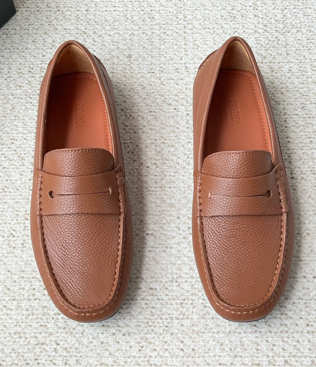 Zegna Pebbled Leather Penny Loafers — front