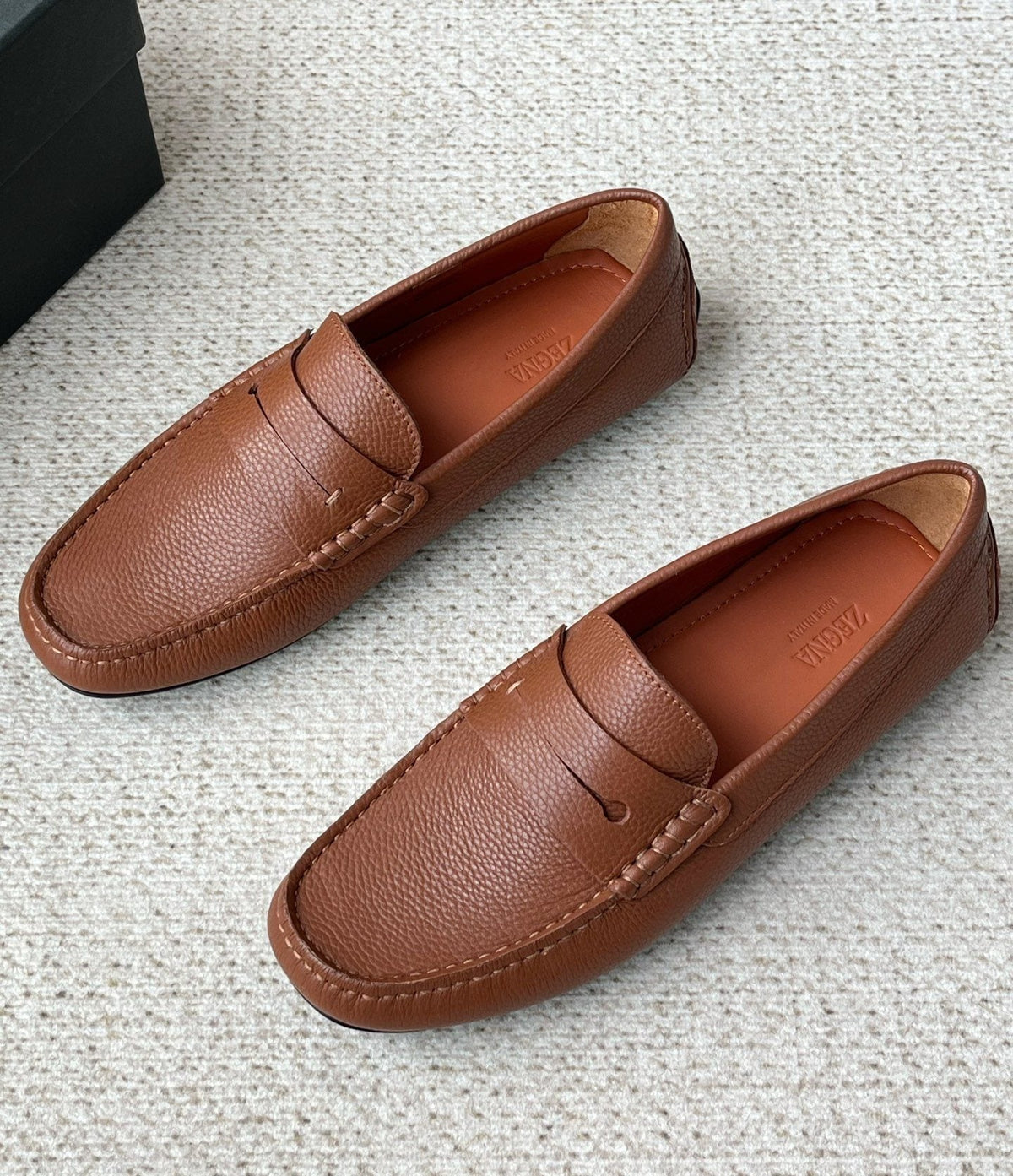 Zegna Pebbled Leather Penny Loafers — front