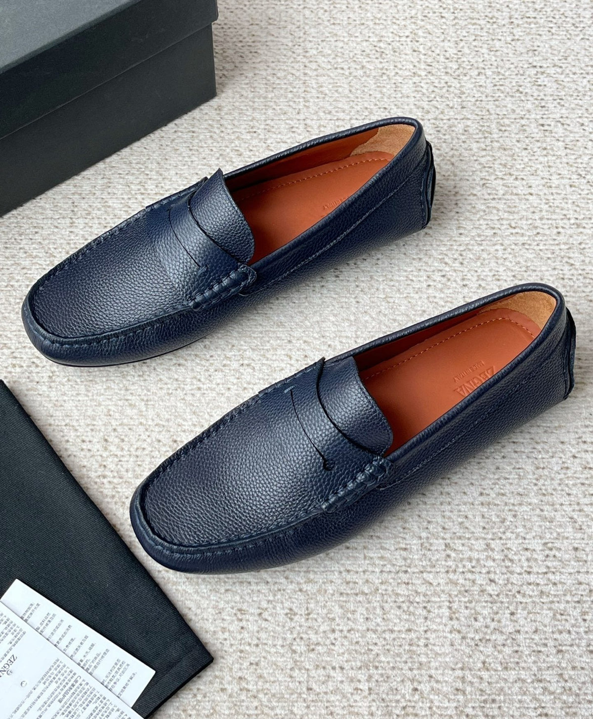 Zegna Pebbled Leather Penny Loafers — front
