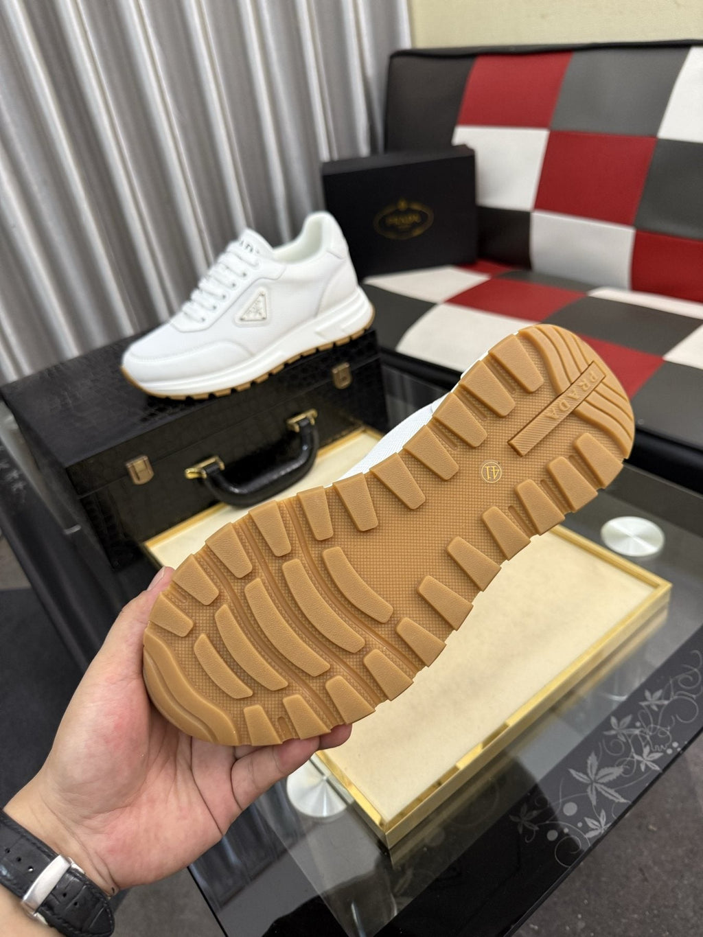 Prada Triangle Plaque Low-Top Sneakers — detail