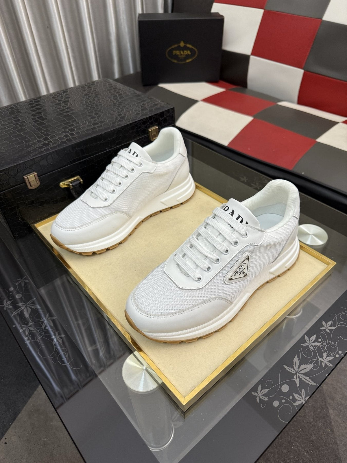 Prada Triangle Plaque Low-Top Sneakers — front