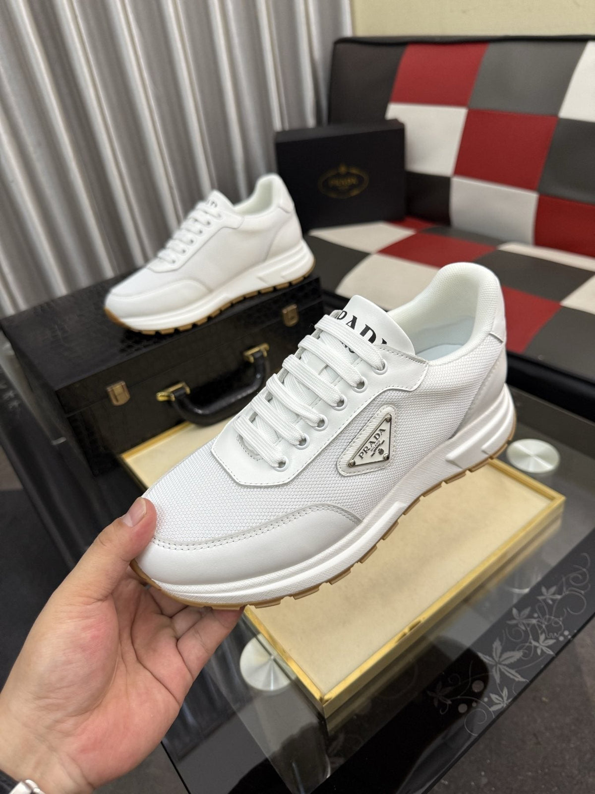 Prada Triangle Plaque Low-Top Sneakers — front